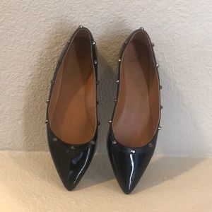 Black pointed flats